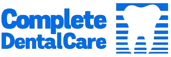 The image shows a sign with text that reads  COMPLETE DENTAL CARE  against a blue background, indicating that the establishment offers comprehensive dental services.