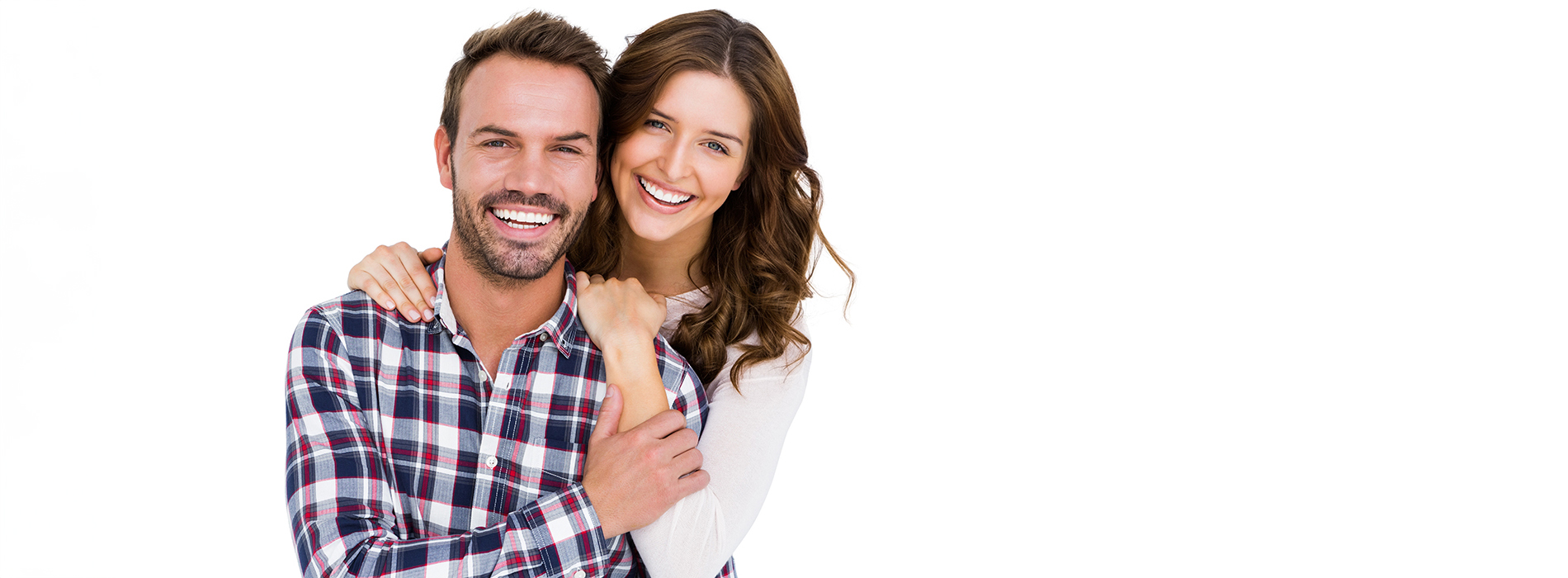 The image shows a man and a woman smiling at the camera  they appear to be standing close together, with the woman s arm around the man s shoulder, suggesting a friendly or affectionate relationship.